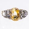 A 19TH CENTURY YELLOW SAPPHIRE AND DIAMOND RING, the oval m