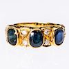AN 18CT YELLOW GOLD SAPPHIRE AND DIAMOND RING, the three ov