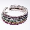 FIVE 18CT WHITE GOLD AND GEM SET BANGLES BY KESSARIS, each 