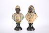 A PAIR OF LATE 19th CENTURY PAINTED TERRACOTTA ORIENTALIST 