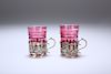 A PAIR OF EDWARDIAN SILVER-MOUNTED CRANBERRY GLASS LIQUEURS
