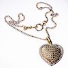 A YELLOW AND WHITE GOLD AND DIAMOND PENDANT OF HEART SHAPE,