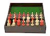 A STAINED AND NATURAL BONE BARLEYCORN PATTERN CHESS SET, 19