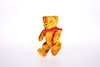 A RARE BICYCLE TEDDY BEAR CLIP, possibly Schuco, with butto