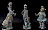 collection of three lladro porcelain figures