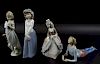 Collection of four lladro porcelain figures