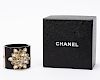 Chanel Floral Motif Black Hinged Bracelet