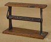 Oak and iron advertising rack, inscribed Chew Sp