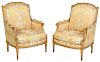 Pair Louis XVI Style Carved and Gilt Wood Bergeres