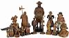Fourteen Continental carved wooden figures, 19th/