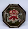FRAMED OCTAGONAL NEEDLEPOINT COAT OF ARMS 