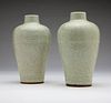 A pair of Chinese light celadon vases