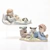 2 LLADRO CHILDREN WITH PUPPIES READING AND SLEEPING
