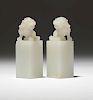 A pair of Chinese carved white jadeite jade seals