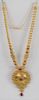 18 Karat Gold Necklace, with large gold medallion mounted with red stones. length 21 1/2 in., 81.4 grams