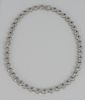 18 Karat White Gold Necklace, with forty- four sections, each set with nine diamonds. length 19 1/2 inches, 60.9 grams.