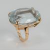 14 Karat Gold Ring, set with large oval aquamarine. approximately 34 carats, 19.2 millimeters x 27.5 millimeters.