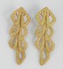 Pair of 18 Karat Gold Clip on Earrings, marked with hallmarks. 30 grams.