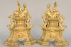 Pair of Louis XIV Gilt Bronze Chenets, Bronze Dore, top having child wearing helmet riding centauresse flanked by two foo dogs, and woman mask on fron