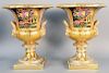 Pair of Large Porcelain Urns, probably 20th century, each of campana form, heavy gilt gold painted with floral vases having handles with masks. height