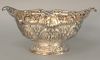 Howard and Company Sterling Silver Oval Center Bowl, with repousse body set on oval repousse foot. height 6 inches, length 12 1/2 inches, 33.4 troy ou