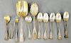 Tiffany and Company Sterling Silver Flatware, including eleven pieces, seven Olympian pattern, one Florentine plue three serving pieces. 17.1 troy oun