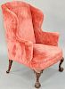 Margolis Custom Mahogany Upholstered Wing Chair, on shell carved knees and ball and claw feet. height 46 inches, width 35 1/2 inches. Provenance: Esta