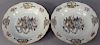 Pair of Chinese Export Plates, armorall center having two crests flanked by lions on each side.