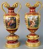 Pair of Royal Vienna Snake Handled Urns, having maroon ground, decorated with classical scenes, raised gilt decoration and double gilt snake handles, 