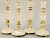 Set of Four Rock Crystal Candlesticks, carved rope twist design, brass mounts, on round twist base set on ball feet. height 11 inches.