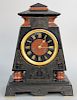Tiffany and Company Egyptian Revival Mantel Clock, pyramid form having black slate with rouge marble,and incised Egyptian motif, remnants of Tiffany a