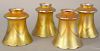Set of Four Quezal Gold Iridescent Shades, pulled feather design, all signed Quezal. height 5 1/8 inches, diameter 4 5/8 inches.