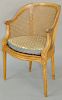 Louis XVI Caned Fauteuil De Bureau, having rounded caned back and arms on tapered round stop fluted legs, French 18th century. height 34 inches. Prove