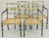 Set of Four Regency Style Open Armchairs, having gilt decoration and black and gold paint decorated cane seats. height 33 inches. Provenance: Estate o