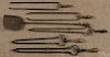 Five brass and iron fire tongs, together with a s