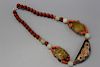 Chinese red coral and DZi beads necklace.