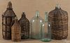 Four Demijohn bottles, 19th c., together with two