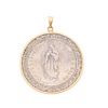 Medalla en plata .925 con imagen de la Vírgen de Guadalupe. Peso: 12.7 g.