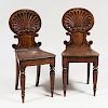 Pair of English Carved Oak Hall Chairs