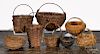 Collection of eight small woven baskets