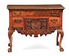 CHIPPENDALE CARVED WALNUT DRESSING TABLE. LANCASTER, PENNSYLVANIA. CIRCA 1780.