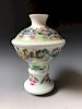 A CHINESE ANTIQUE FAMILLE ROSE VASE