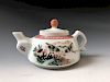A CHINESE ANTIQUE FAMILLE ROSE PORCELAIN TEA POT, SIGNED BY LIOU ZHONGQING 
