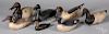 Seven carved and painted duck decoys.