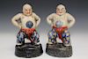 A Pair of Chinese Porcelain Wrestler Figurines, Marked.