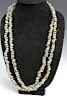 A long antique glass bead necklace.