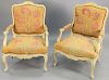 Pair of Louis XV style fauteuil, with needlepoint upholstery, ht. 38 1/4 in., wd. 26 1/2 in.