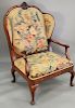 Queen Anne style mahogany armchair, convertible to make a bed, with needlepoint back and seat, ht. 53 in., wd. 36 in.