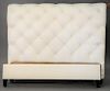 White leather queen size bed frame. ht. 55 in.