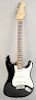 Fender Stratocaster electric guitar, 1984, black and white in fitted case, serial number E480426.